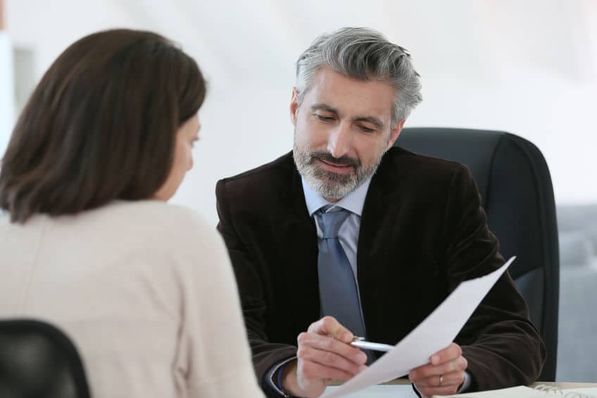 injury attorney meeting client in office