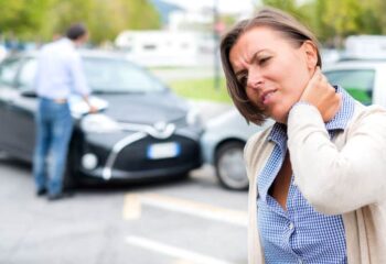 woman with neck pain after car accident