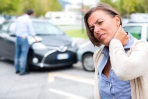 woman with neck pain after car accident