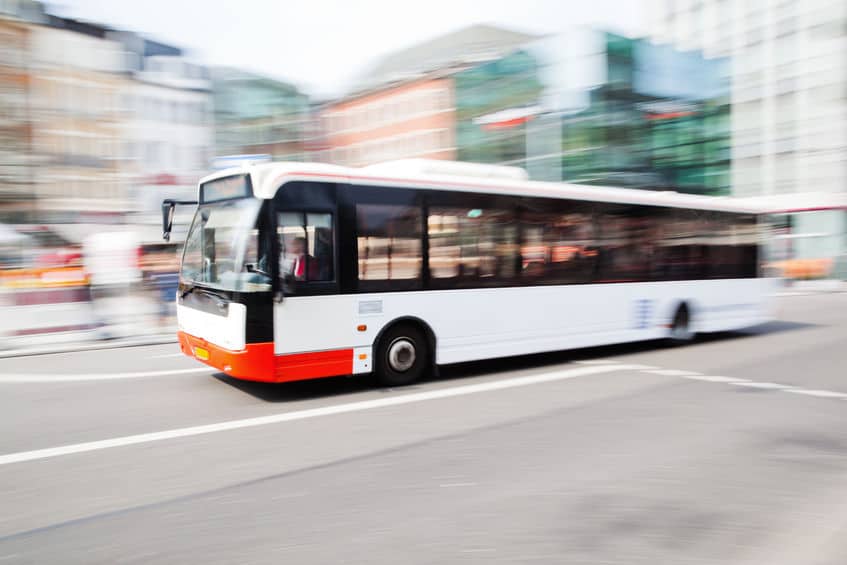 driving bus in city traffic in motion blur