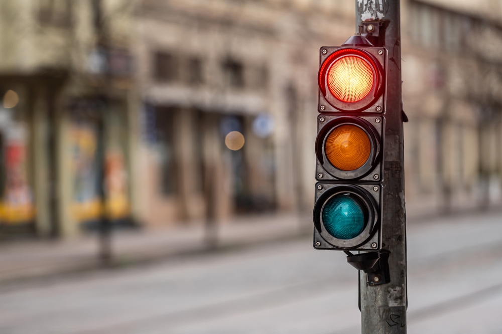 If someone runs a red light and you hit them who is at fault?