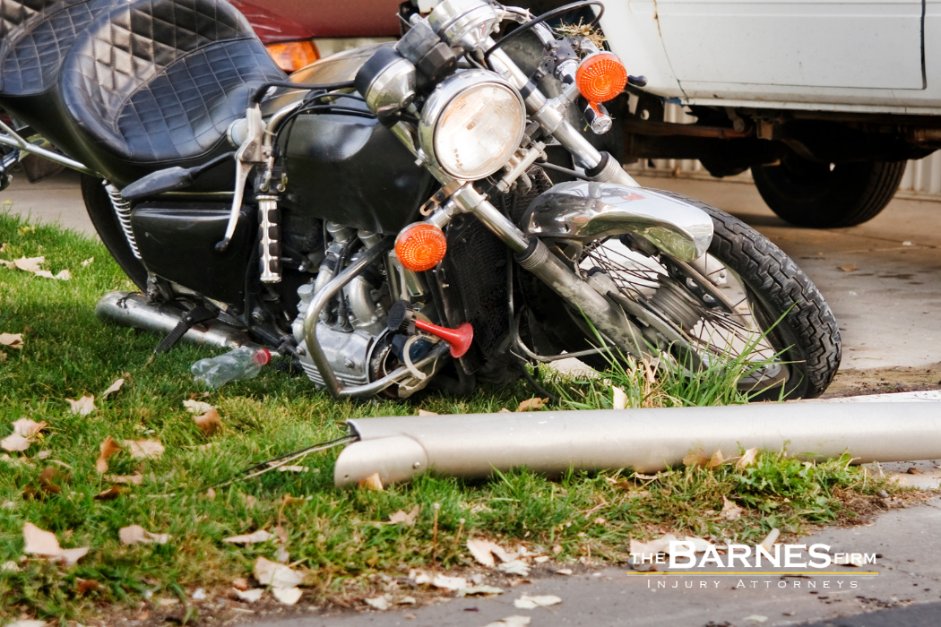 motocycle laying on its side after an accident