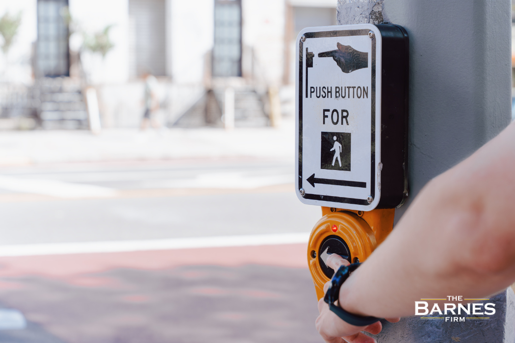pedestrian pushing crossing signal in rochester