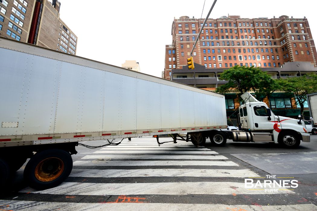 semitruck making a turn on a nyc city street